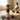 Stacked colorful candles with a Buddha head base on a wooden table, blurred figure in the background.